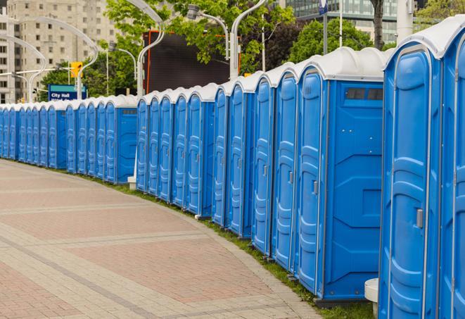 a row of sleek and modern portable restrooms at a special outdoor event in Munroe Falls OH